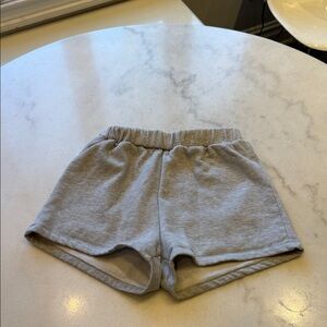 Grey athletic shorts with elastic waist